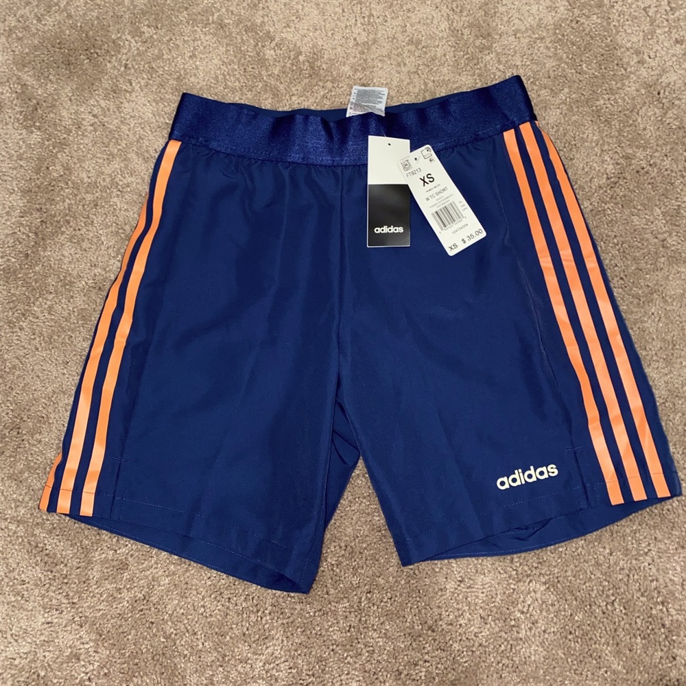 Navy blue adidas women’s athletic shorts! 100% polyester with elastic waistband!